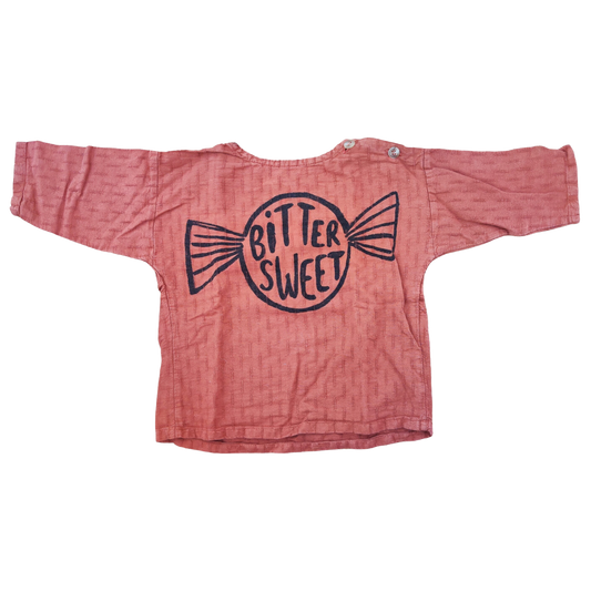Pre-loved long sleeve "Bitter Sweet" blouse in faded rusty orange from the brand Bobo Choses, evasé fit. Made from 100% organic cotton.