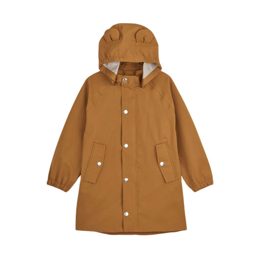 Liewood new soft shell jacket in mustard. The jacket is windproof, breathable, lightweight, with a water column pressure of 8.000 mm. Equipped with name tag and reflectors, it closes with zipper and press studs on the front side.