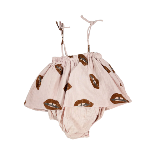 Pre-loved Piupiuchick Pink Lips muslin romper dress, made from 100% cotton.
